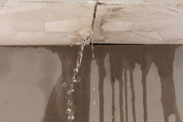 Professional Flood Damage Cleanup technician working in Durham, ME